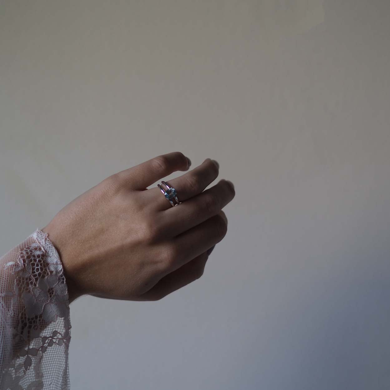 Handmade Oval Aquamarine Ring from Bianca Jones Jewellery, London. Showcases an oval aquamarine stone set atop two white gold bands