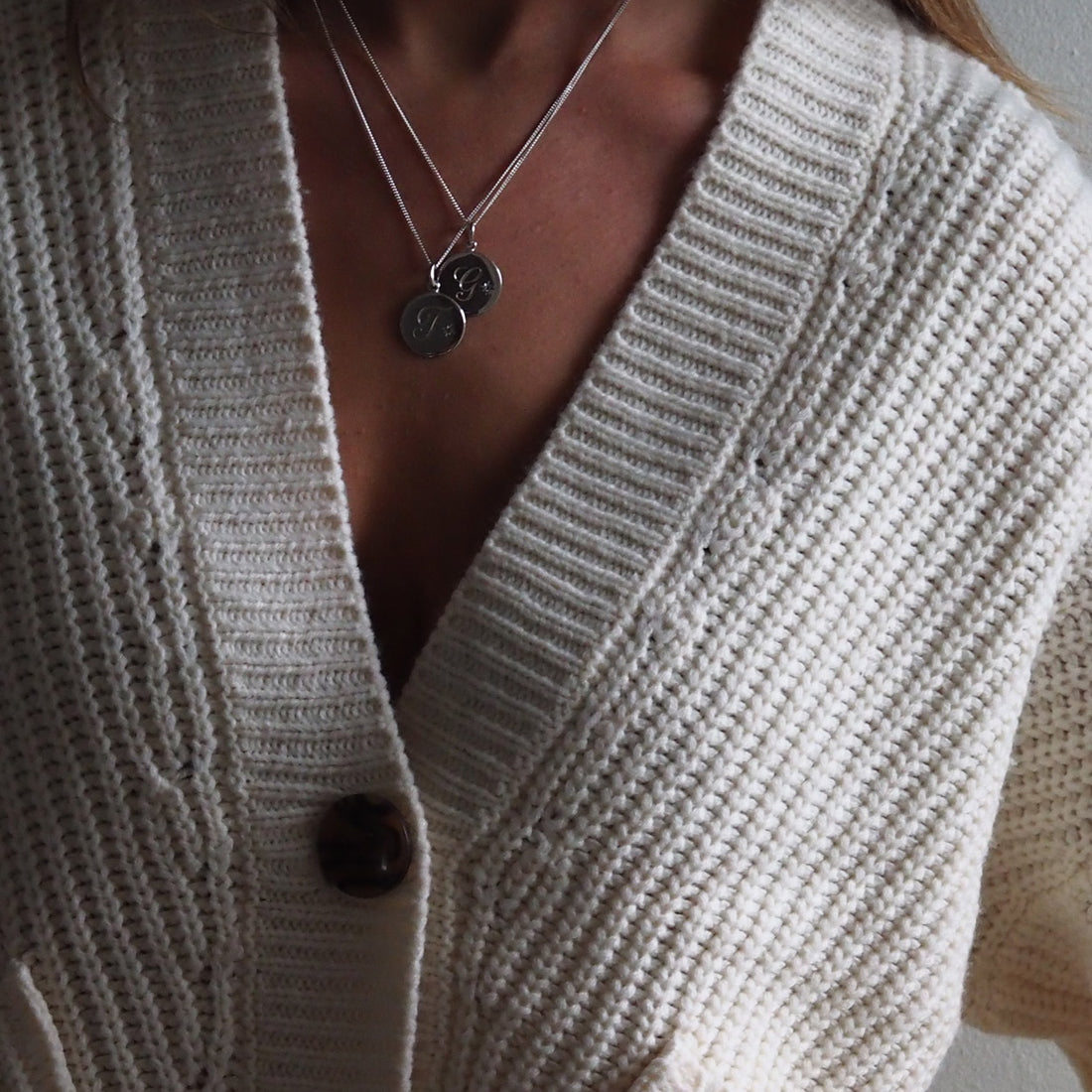 Birthstone March Aquamarine Initial Necklace with a hand-engraved scrolled initial and brilliant-cut Aquamarine in a Victoriana star-style setting, symbolising friendship, harmony, and trust. Perfect for March birthdays.