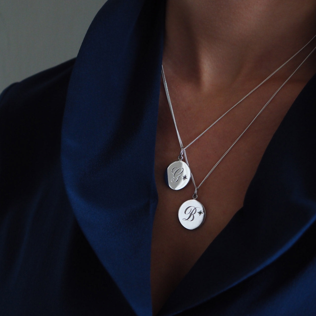 Solid sterling silver Birthstone September Sapphire Initial Necklace with a hand-engraved initial and a brilliant-cut Sapphire set in a Victorian-style star setting, symbolising wisdom, protection, and timeless elegance.