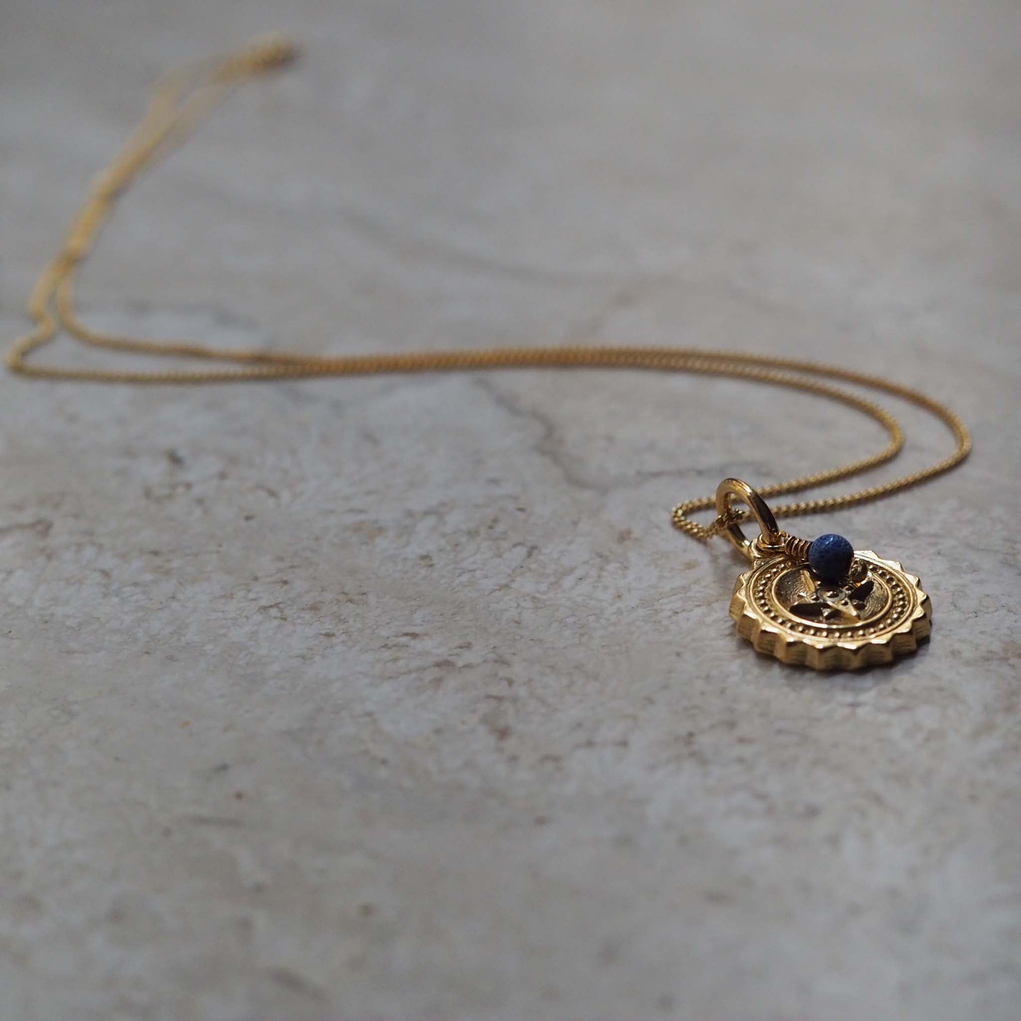 Compass Necklace with Lapis Lazuli. A gift of guidance and protection for adventurers, enhancing joy and vitality on their journey.