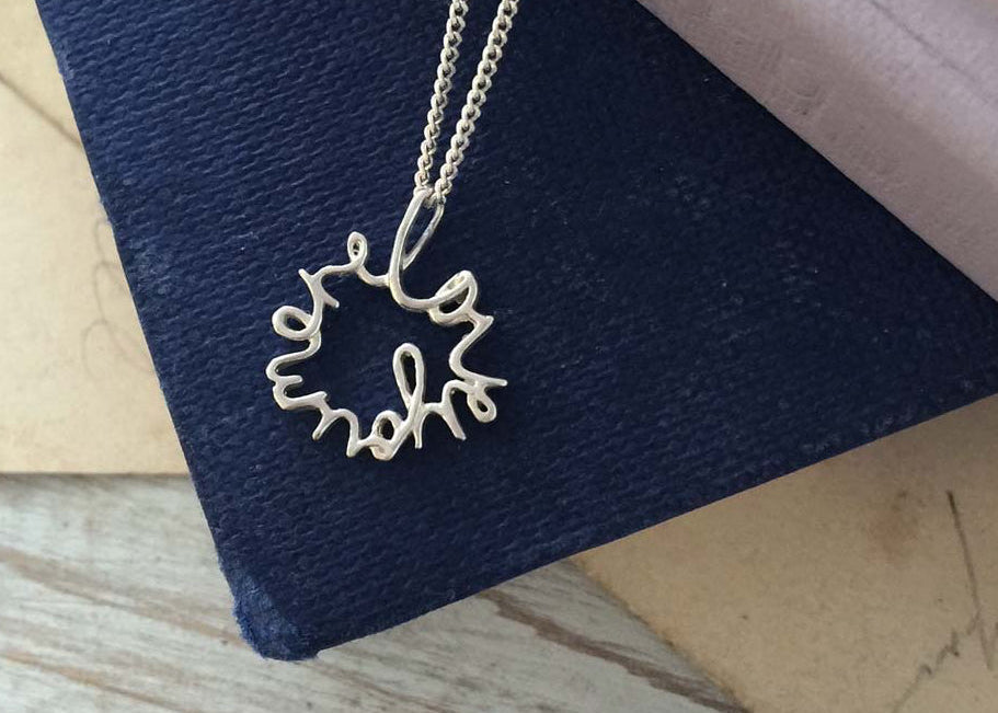 Love You More Petite Necklace in recycled sterling silver — delicate and symbolic, designed for everyday wear and layering.