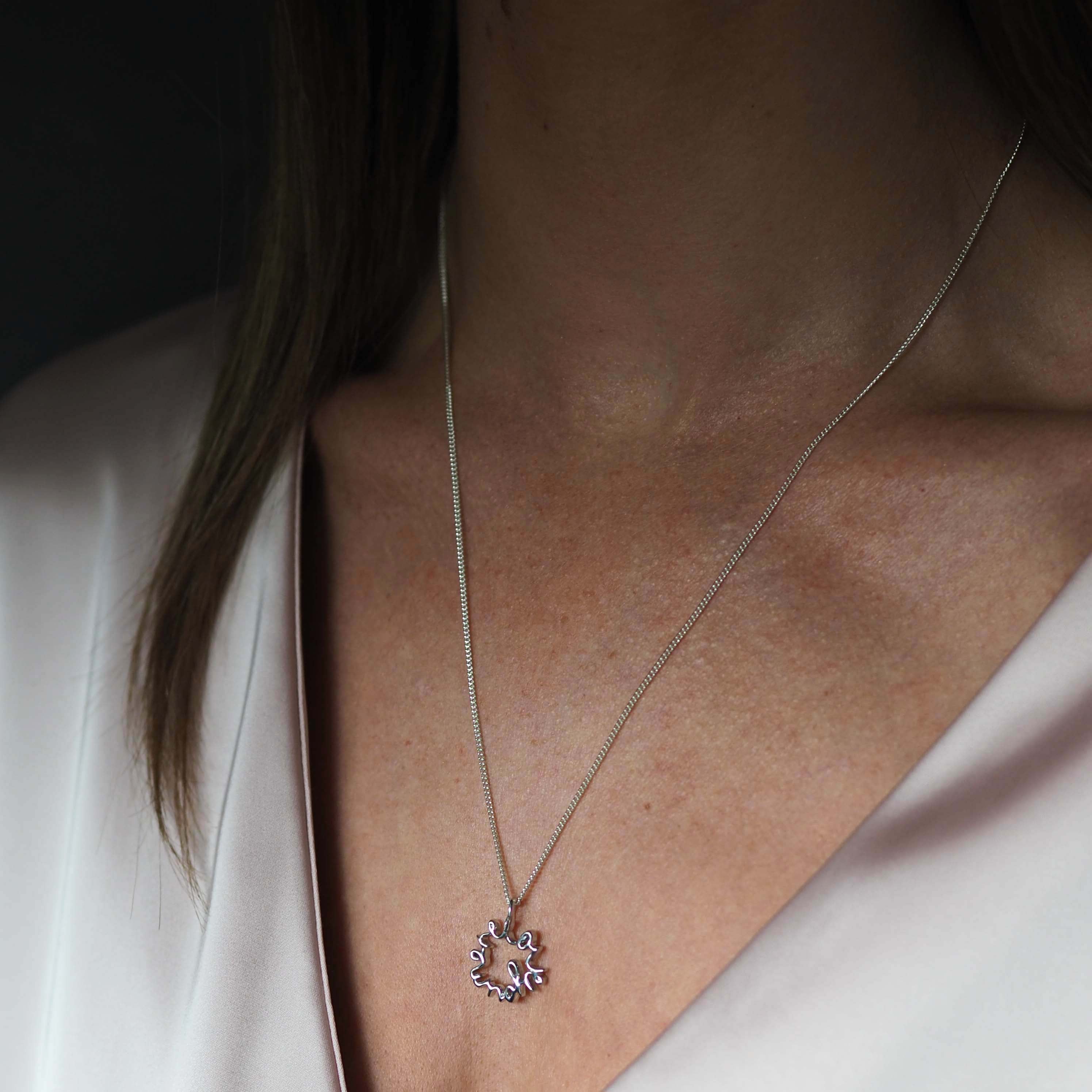 Love You More Large Necklace in recycled sterling silver — sculptural pendant symbolising deep love and connection, handmade in London.