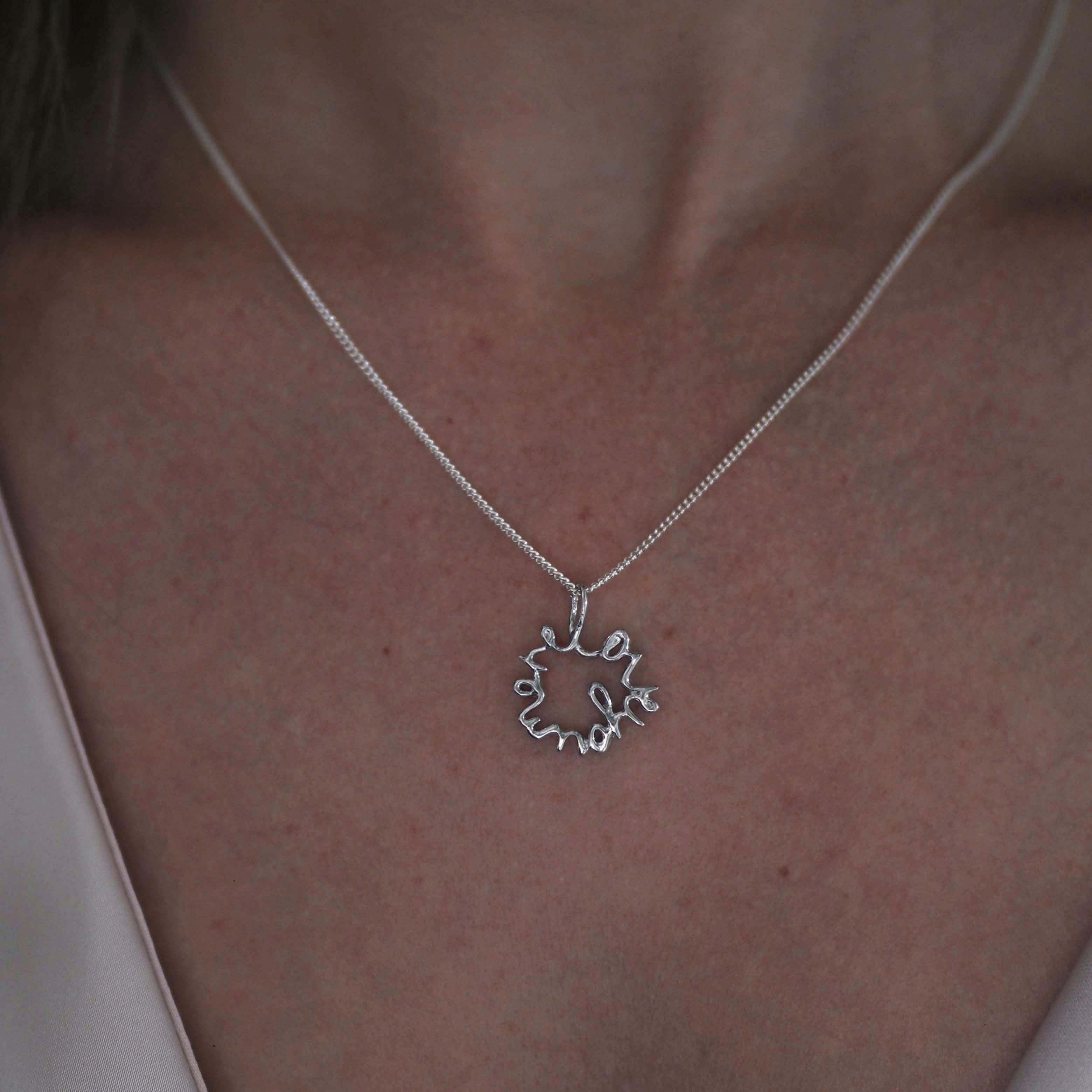 Love You More Petite Necklace in recycled sterling silver — delicate and symbolic, designed for everyday wear and layering.