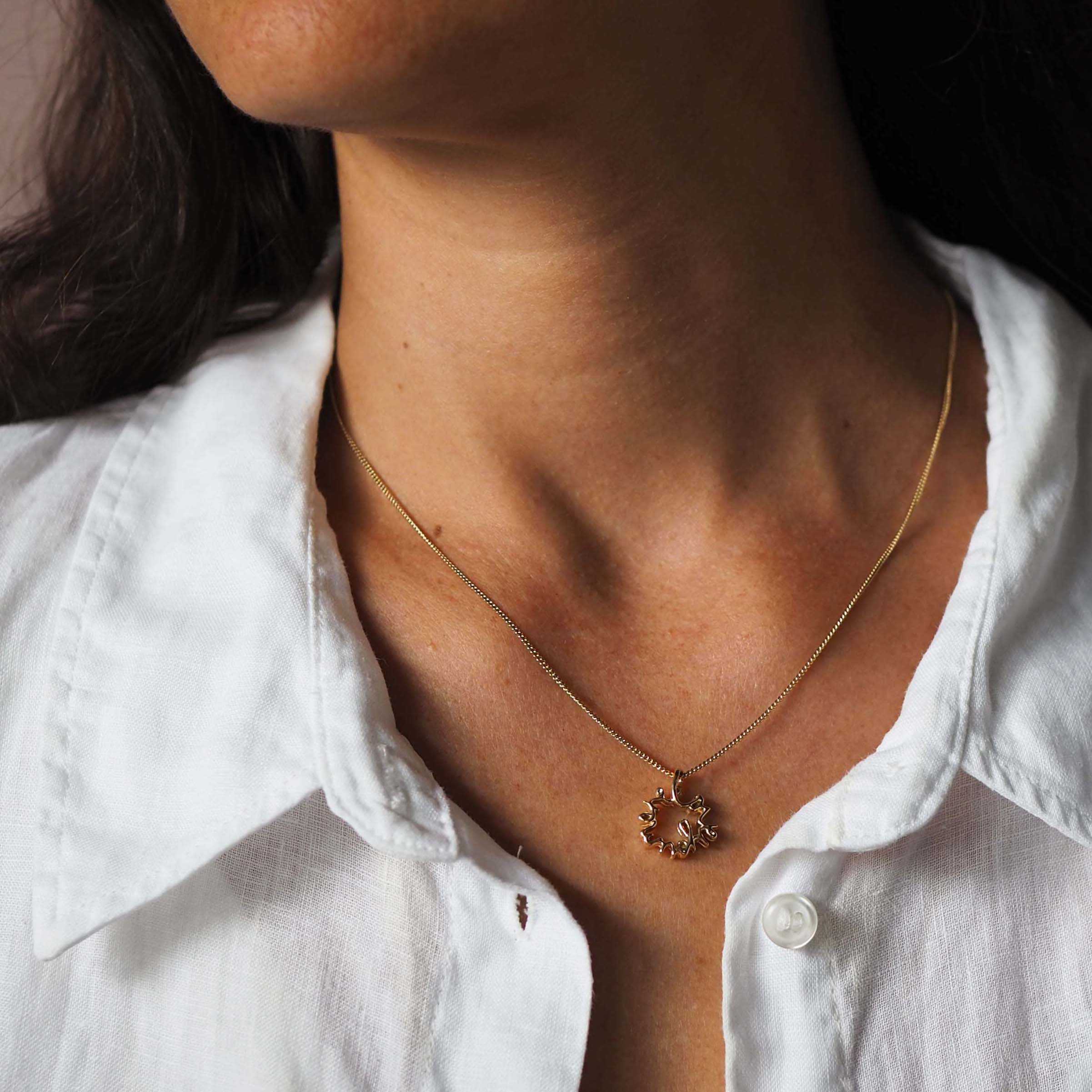 Love You More Petite Necklace in solid yellow, white, or rose gold — delicate gold pendant symbolising deep love and connection, handcrafted in London.