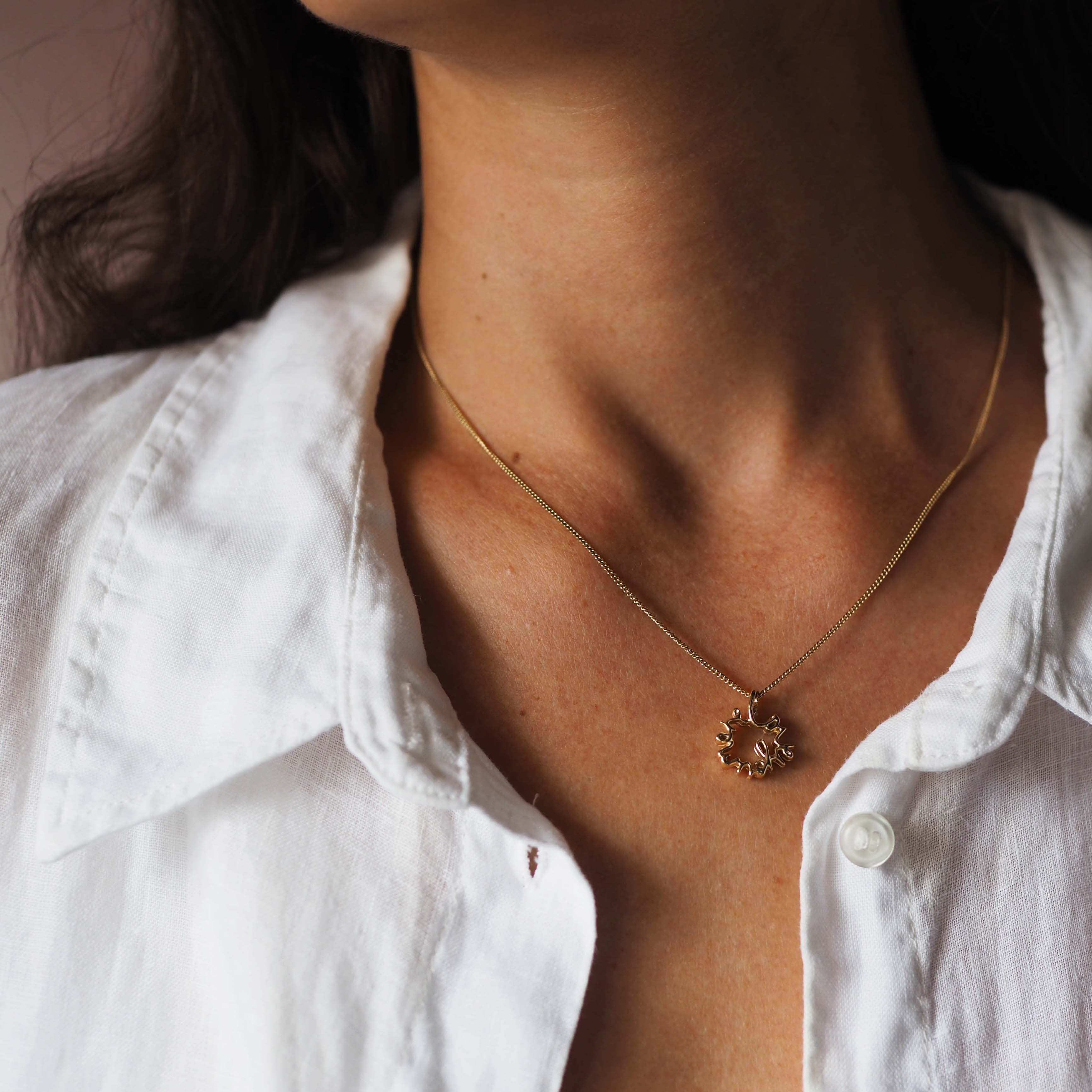 Love You More Petite Necklace in solid yellow, white, or rose gold — delicate gold pendant symbolising deep love and connection, handcrafted in London.