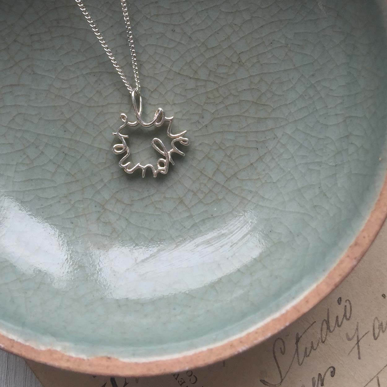 Love You More Petite Necklace in recycled sterling silver — delicate and symbolic, designed for everyday wear and layering.