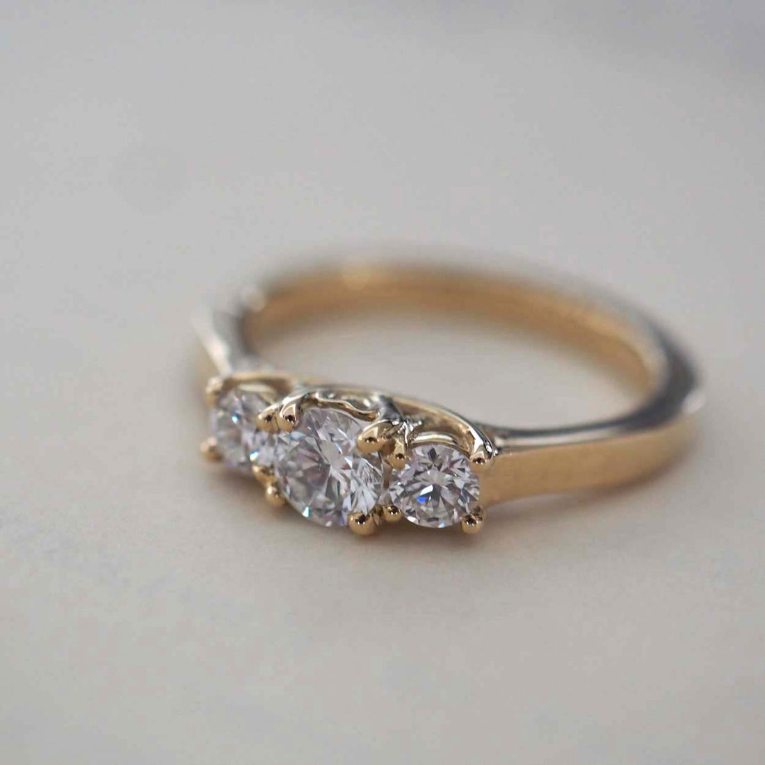 Bespoke Round Diamond Engagement Ring with Customisable Semi-Precious Side Stones and Secret Heart Detail in Recycled Yellow Gold, Handcrafted in London by Bianca Jones 