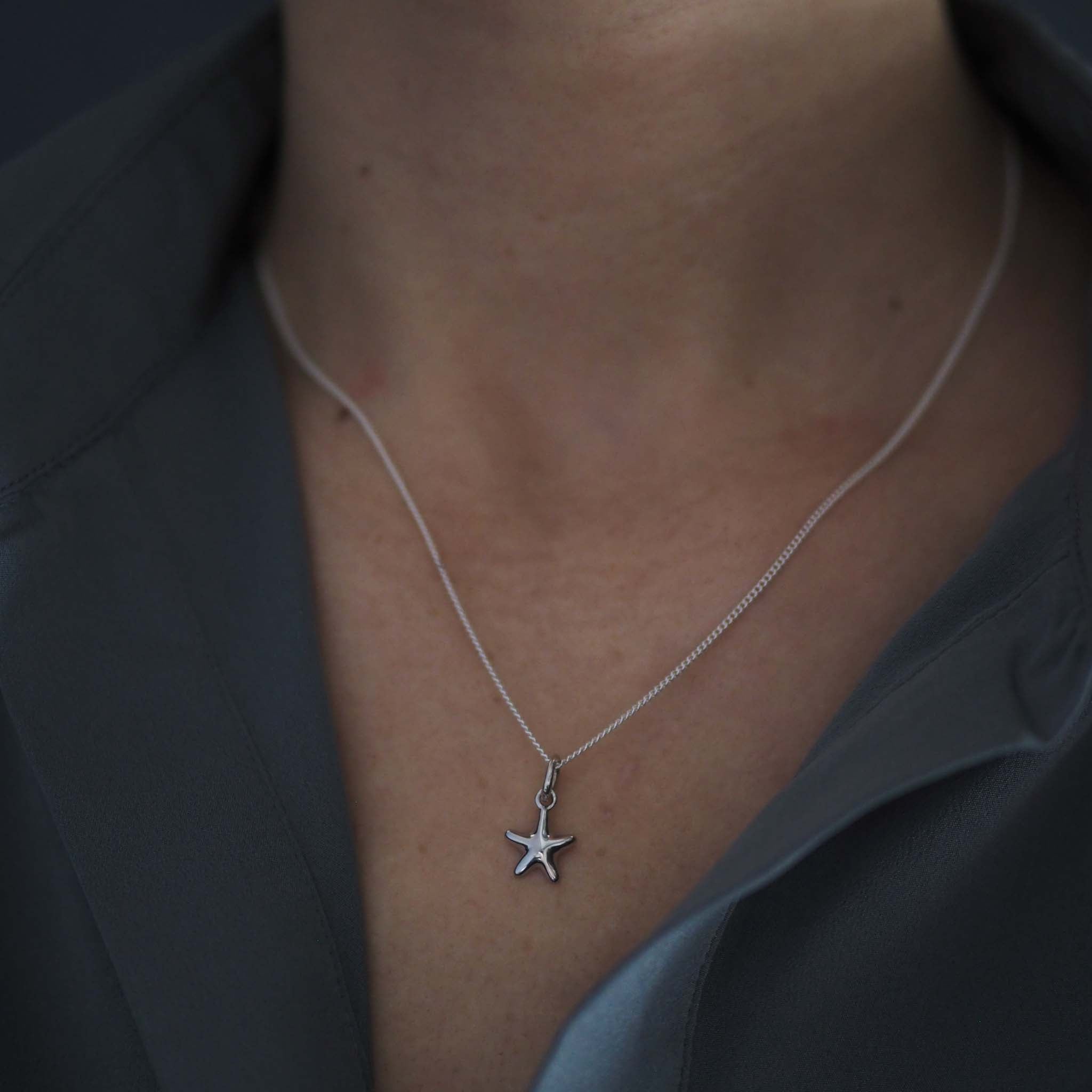 Bianca Jones sculptural style starfish necklace in sterling silver or gold vermeil, evoking the beauty of oceanic life.