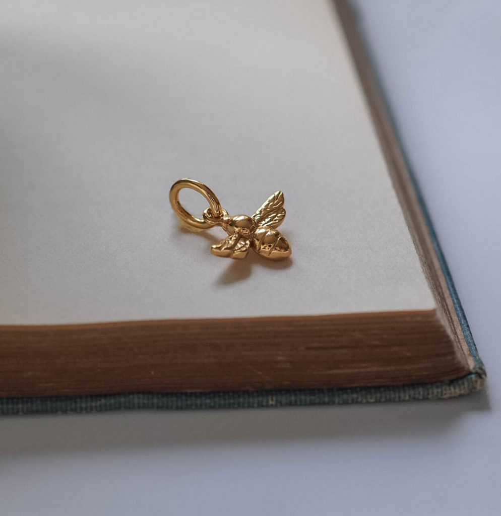 Bianca Jones Jewellery handmade solid gold bumble bee charm, available in white, rose, and yellow gold, showcasing detailed craftsmanship