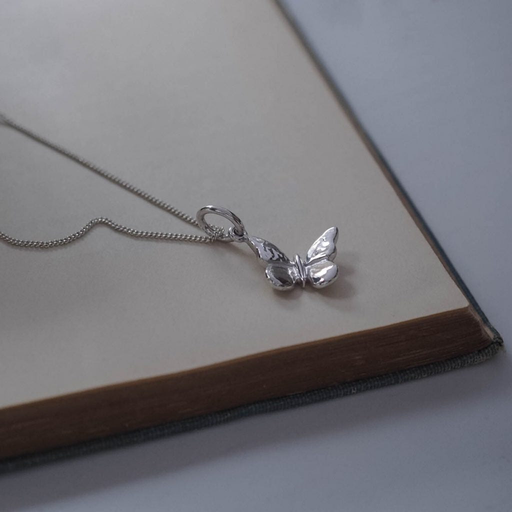 Bianca Jones butterfly pendant available in sterling silver or gold vermeil, capturing the essence of transformation and grace.