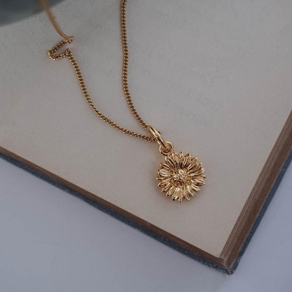 Bianca Jones daisy necklace available in silver or gold vermeil, symbolising innocence and new beginnings