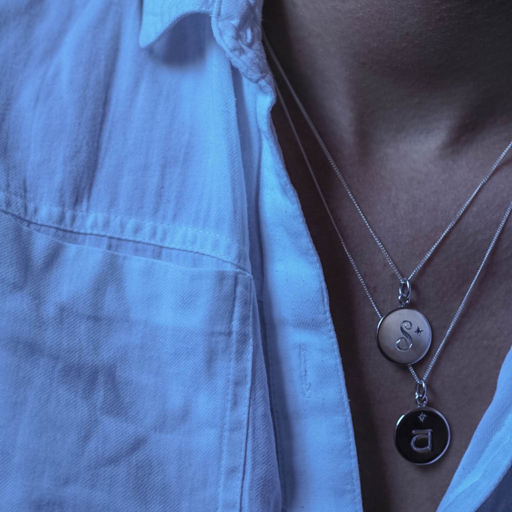 Silver Diamond Initial Necklace with hand-engraved letter and star-set diamond. Handmade in London in solid sterling silver.