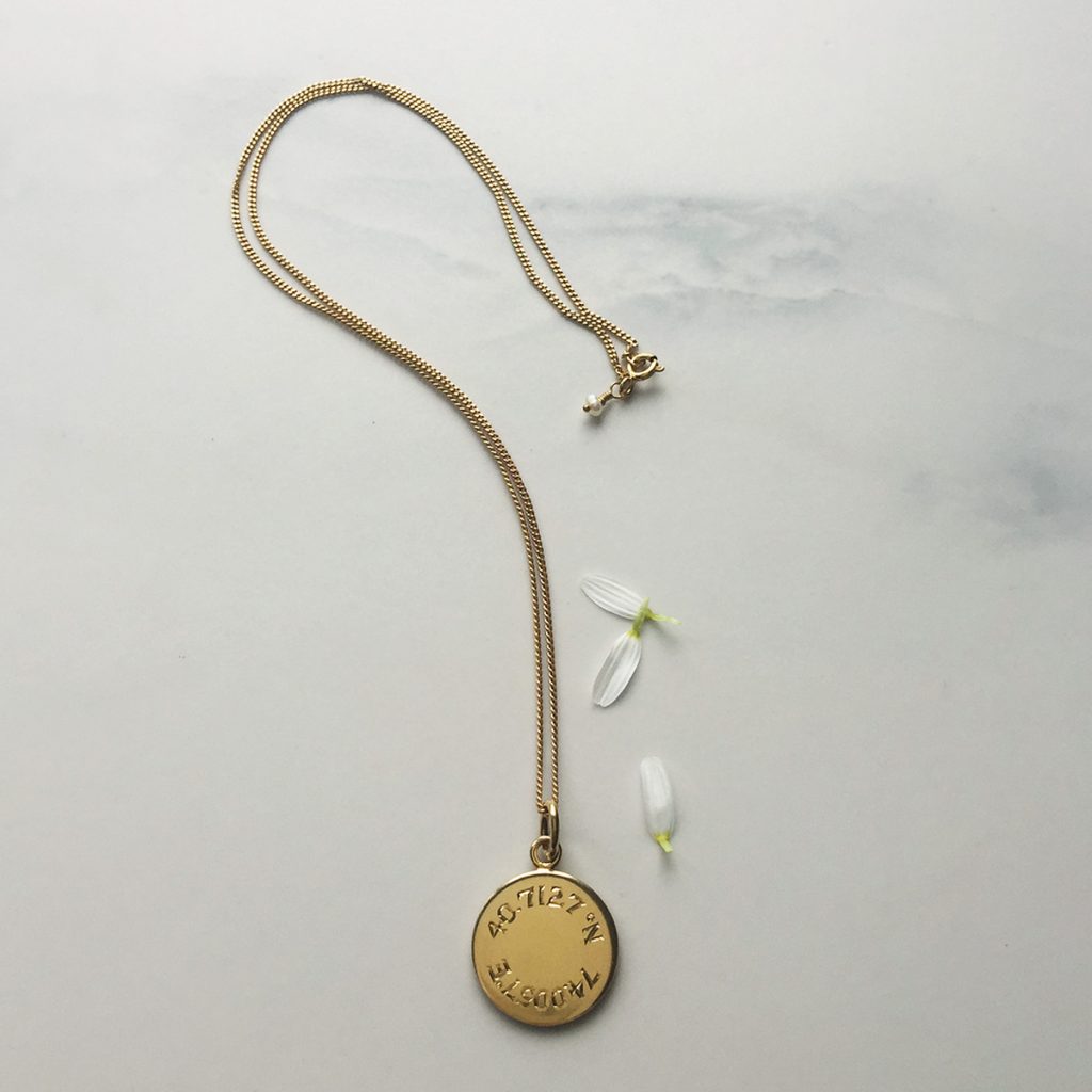 Latitude and Longitude Necklace in Yellow Gold Vermeil, hand-engraved with personalised coordinates. A meaningful keepsake symbolising love and connection.