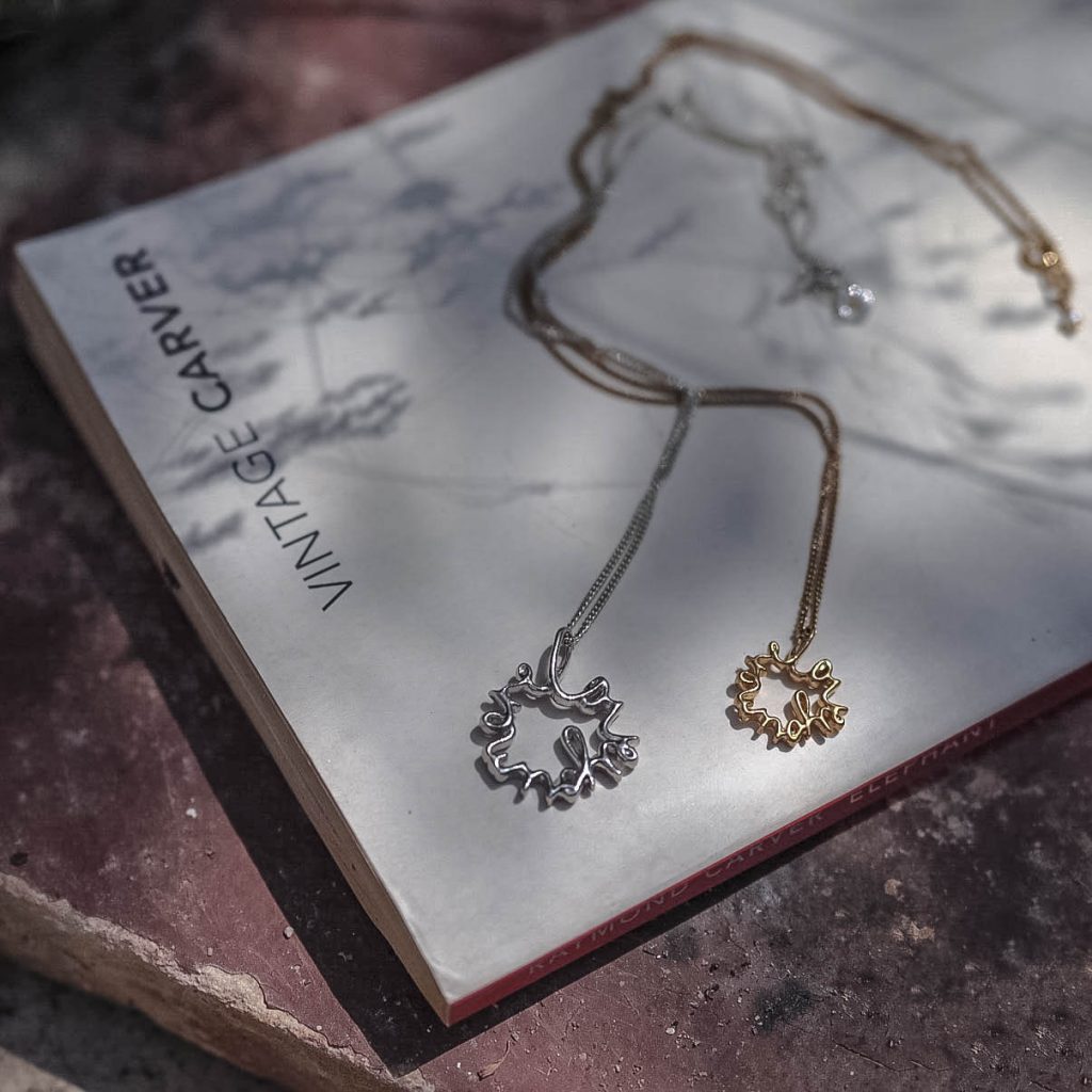 Love You More Large Necklace in recycled sterling silver — sculptural pendant symbolising deep love and connection, handmade in London.