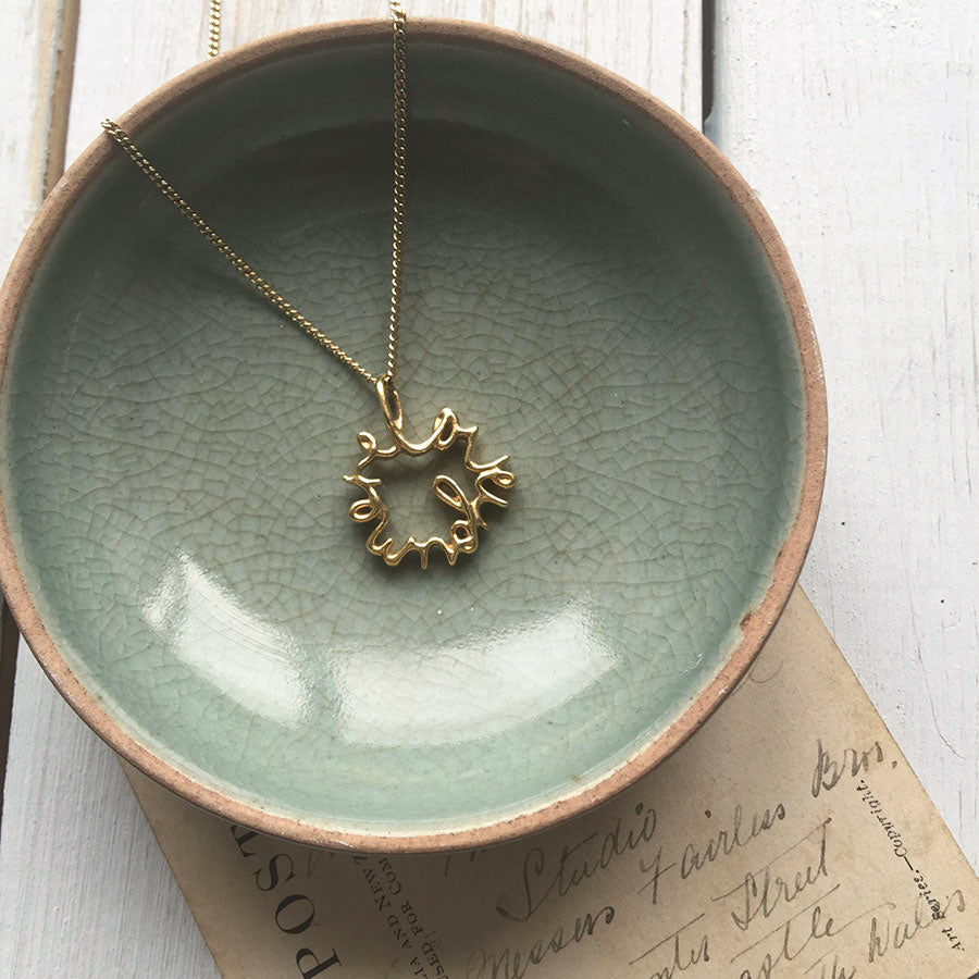 Solid gold Statement Love You More Necklace — a sculptural, heartfelt piece inspired by lasting love and deep connection.