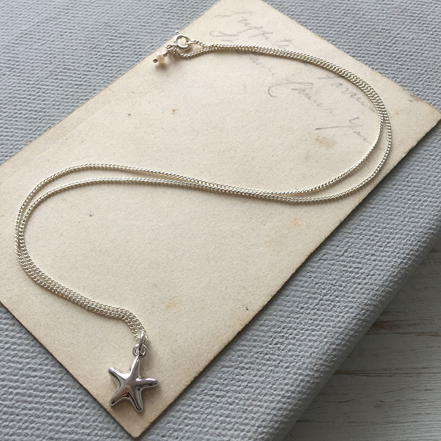 Bianca Jones sculptural style starfish necklace in sterling silver or gold vermeil, evoking the beauty of oceanic life.