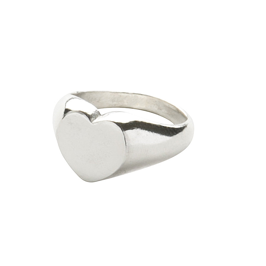 handmade sterling silver signet heart ring, showcasing intricate detailing and craftsmanship