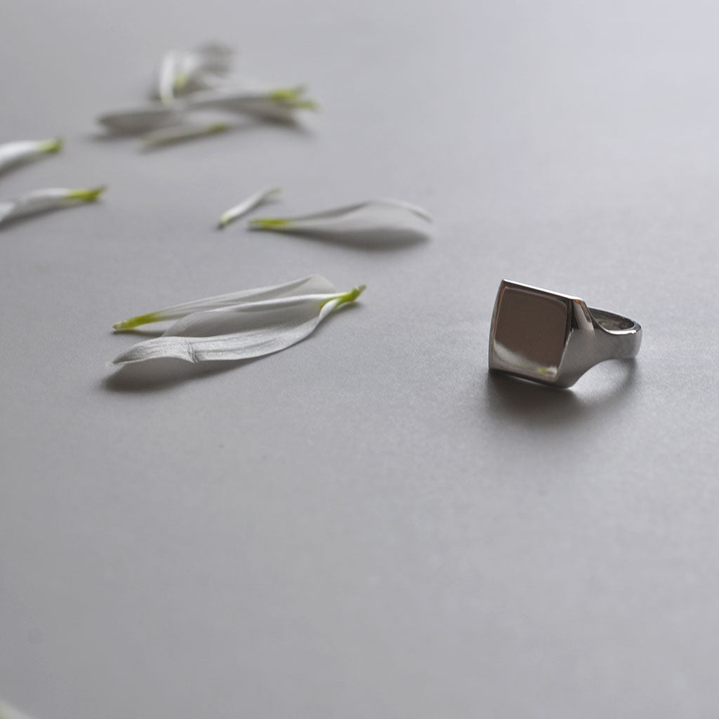 Bianca Jones bespoke white gold signet ring with a square face, showcasing a contemporary take on a classic design