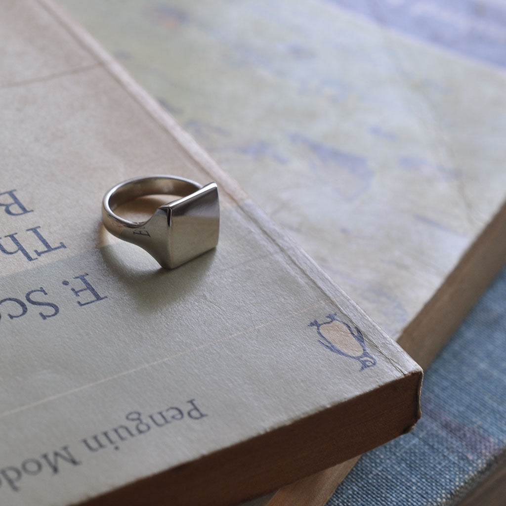 Bianca Jones bespoke white gold signet ring with a square face, showcasing a contemporary take on a classic design