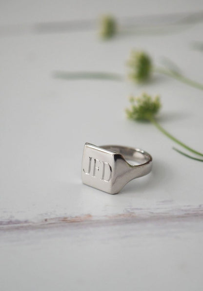 Bianca Jones bespoke white gold signet ring with a square face, showcasing a contemporary take on a classic design