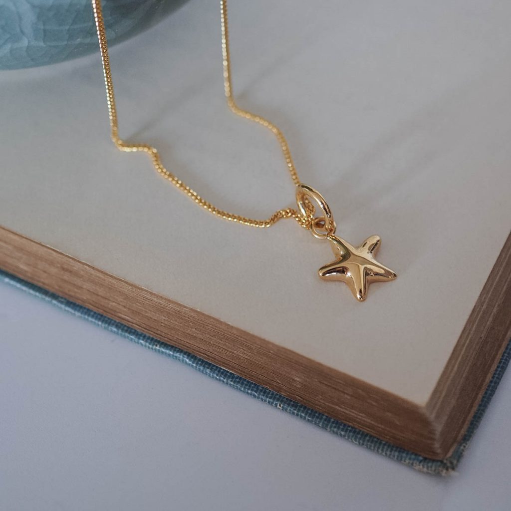 Bianca Jones sculptural style starfish necklace in sterling silver or gold vermeil, evoking the beauty of oceanic life.