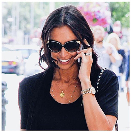 Christine Lampard wearing a Birthstone Initial Necklace with a 'C' initial and amethyst birthstone, styled elegantly for a casual outing