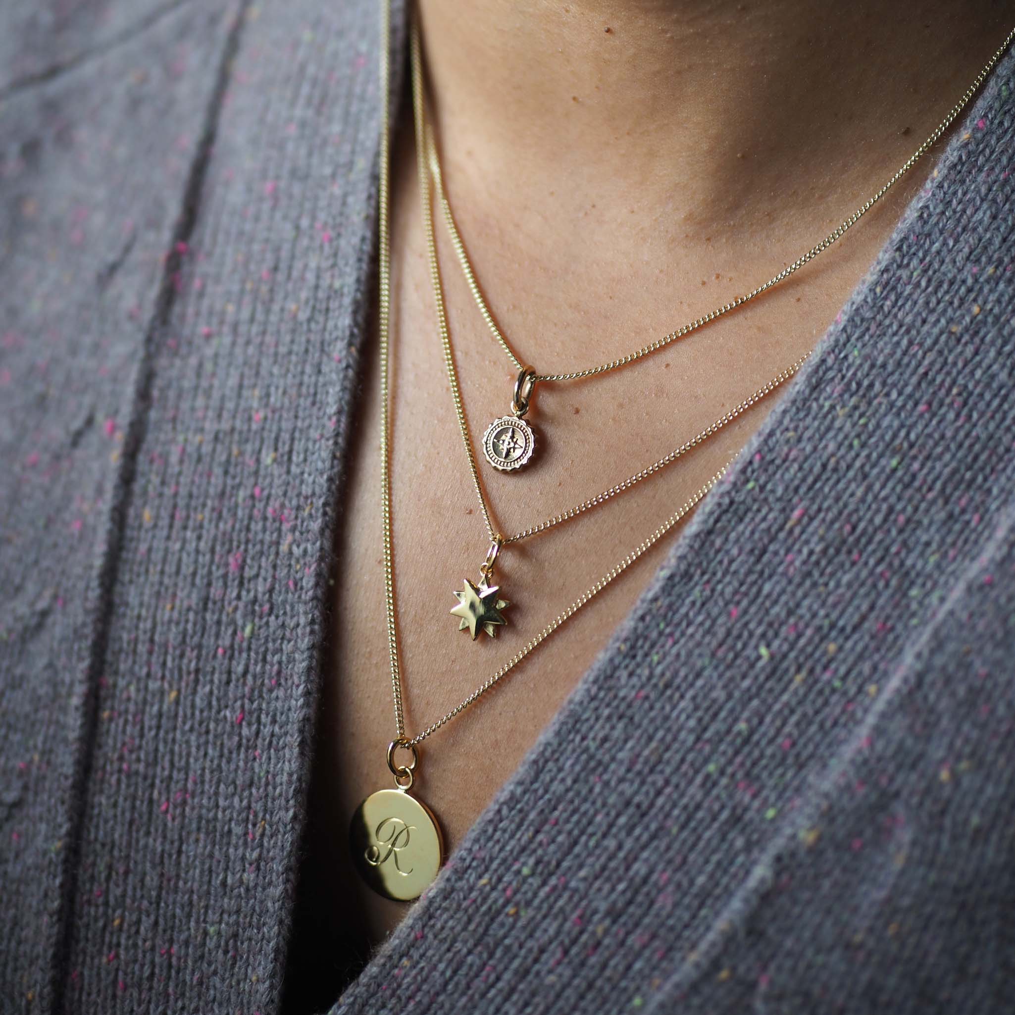 Close-up of the Starburst Necklace by Bianca Jones, capturing the celestial beauty and inspiration behind this meaningful piece