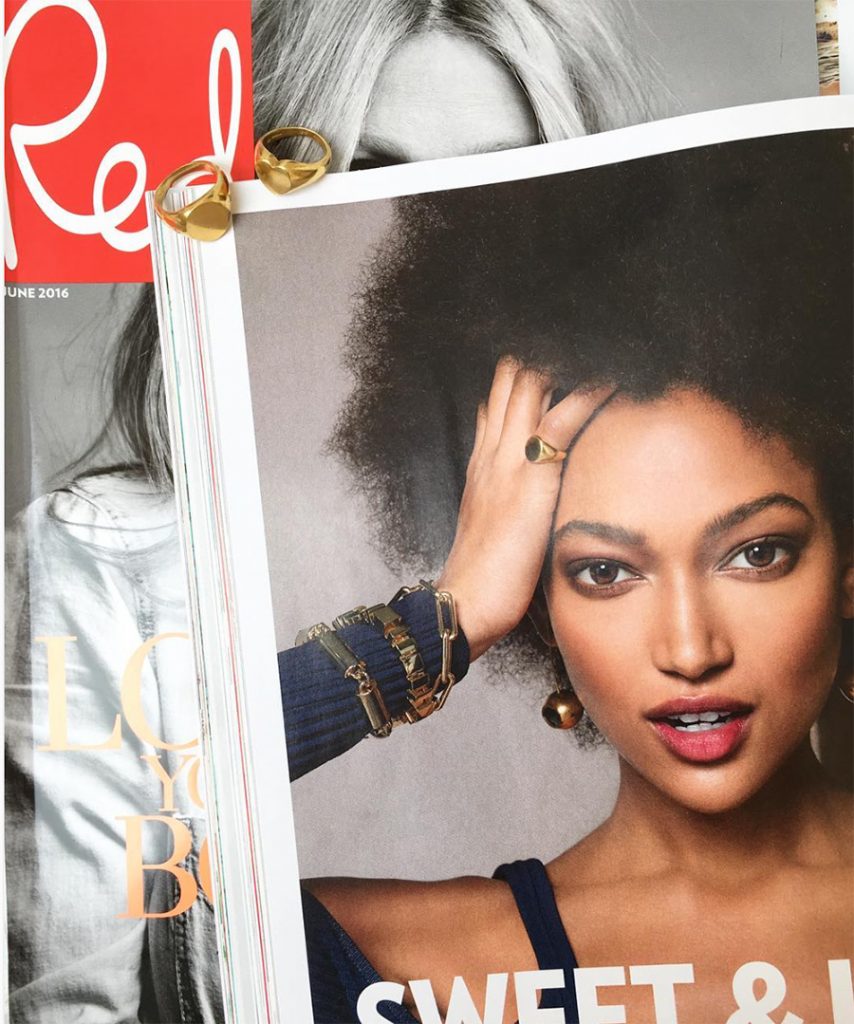 Bianca Jones' classic signet ring in gold, featured in Red Magazine, showcasing its timeless and powerful design.