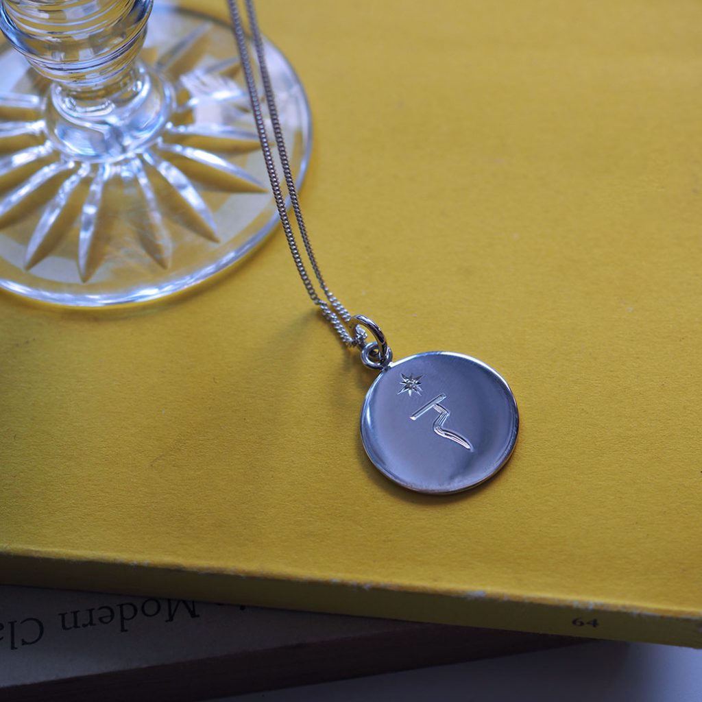 Solar Plexus Chakra Necklace in sterling silver by Bianca Jones, symbolising personal power and emotional balance