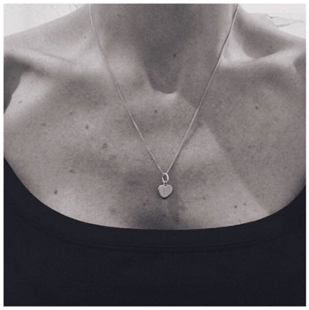 Close-up of the Love Heart Necklace by Bianca Jones, featuring a simple and elegant heart design symbolising love and connection.