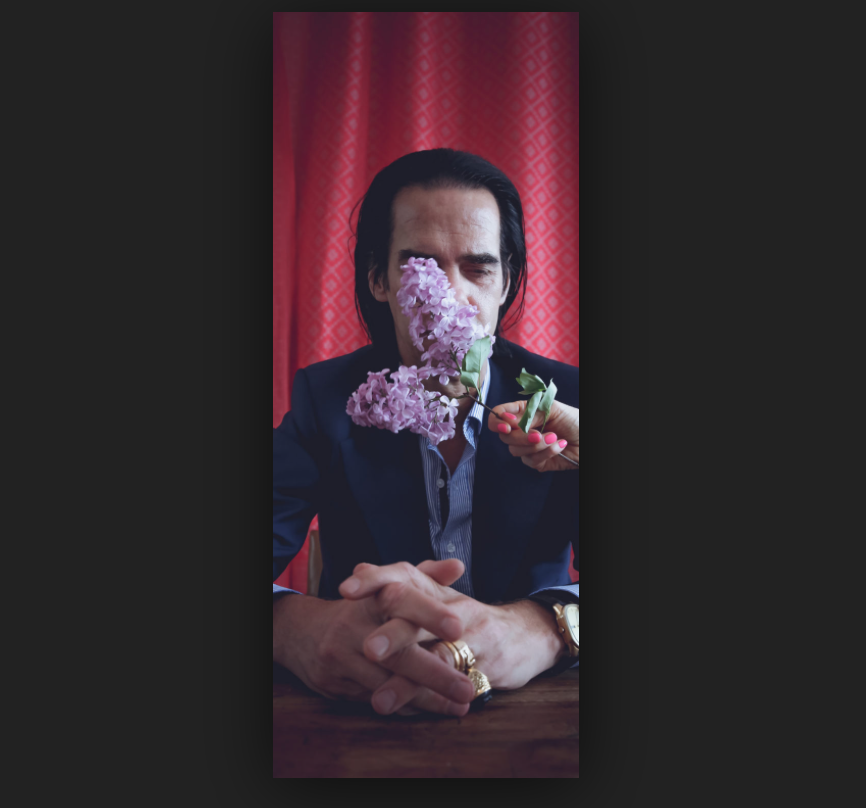 Nick Cave reflecting on grief and love, describing it as an overwhelming force intertwined with love, guiding us through darkness with spirit guides toward change and redemption