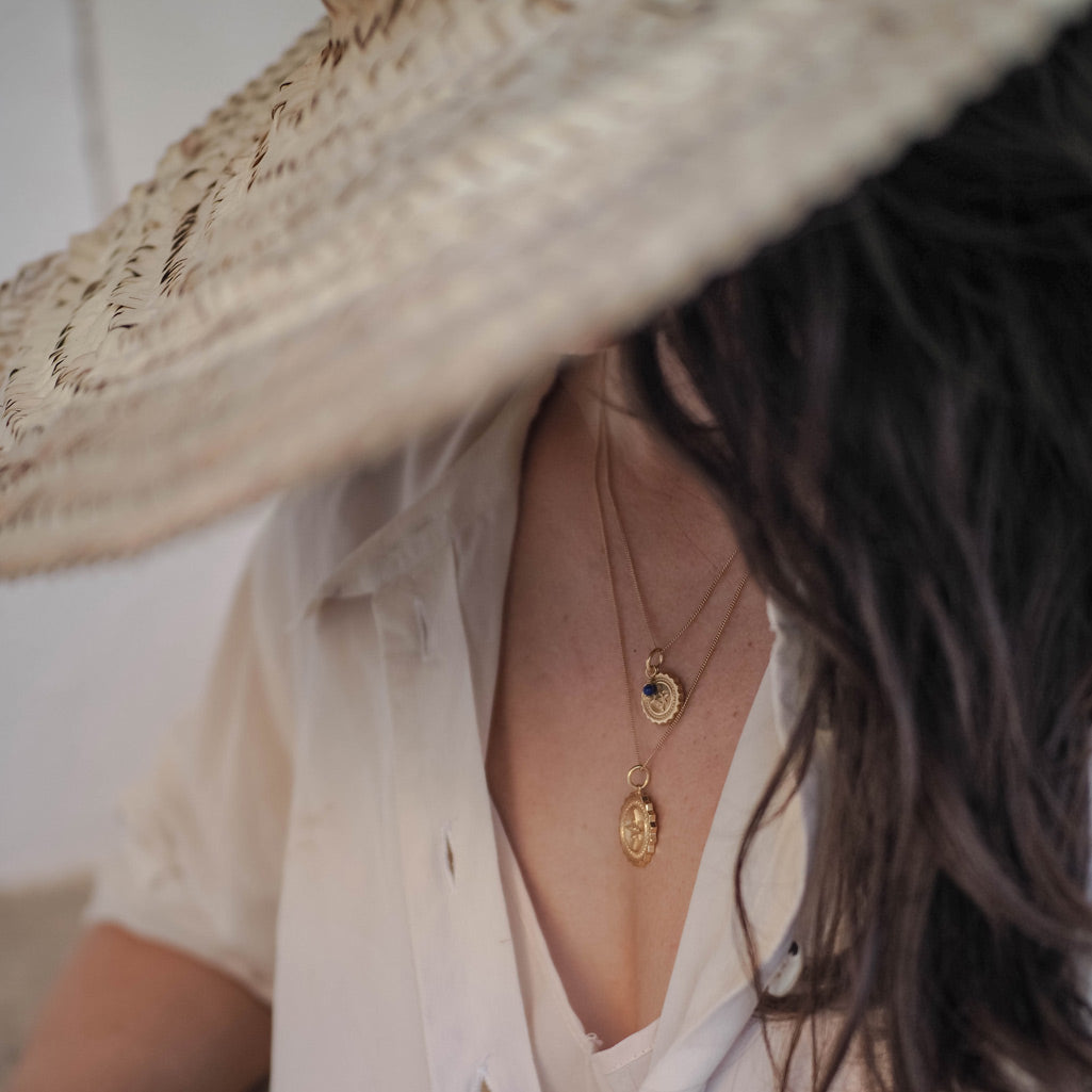 Compass Necklace with Lapis Lazuli. A gift of guidance and protection for adventurers, enhancing joy and vitality on their journey.