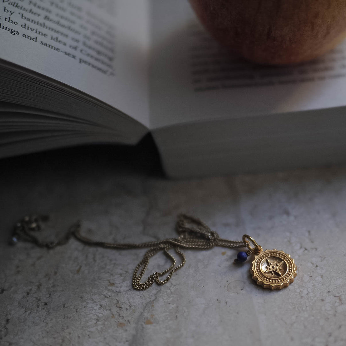 Compass Necklace with Lapis Lazuli. A gift of guidance and protection for adventurers, enhancing joy and vitality on their journey.