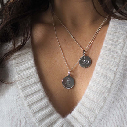 Chakra Necklace in the Chakra Necklace Collection, hand-engraved with one of the seven sacred Chakra symbols and star-set with a brilliant Diamond, symbolising balance, spiritual harmony, and strength.