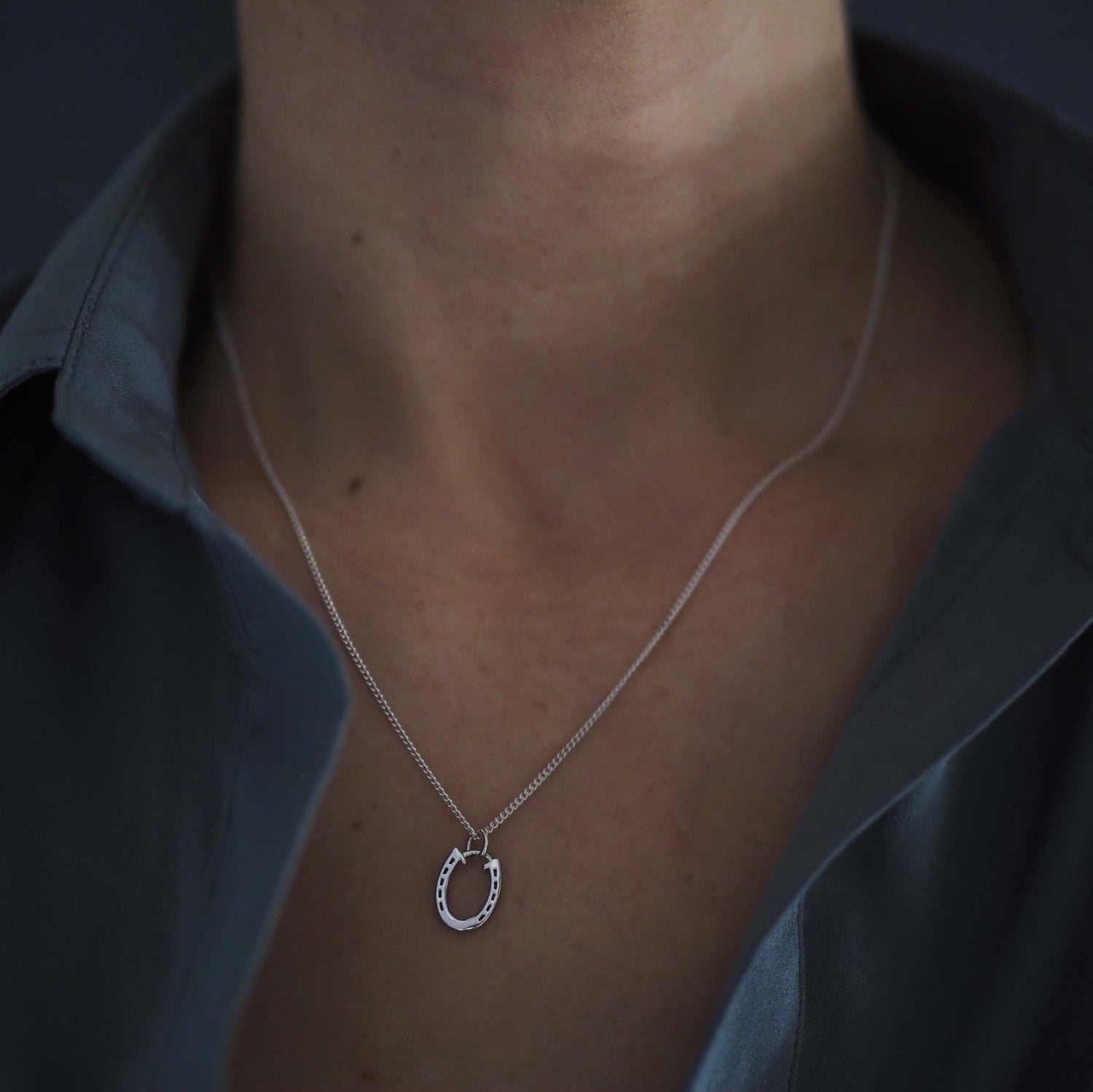 Bianca Jones lucky horseshoe necklace available in silver or gold vermeil, symbolising good fortune and protection.