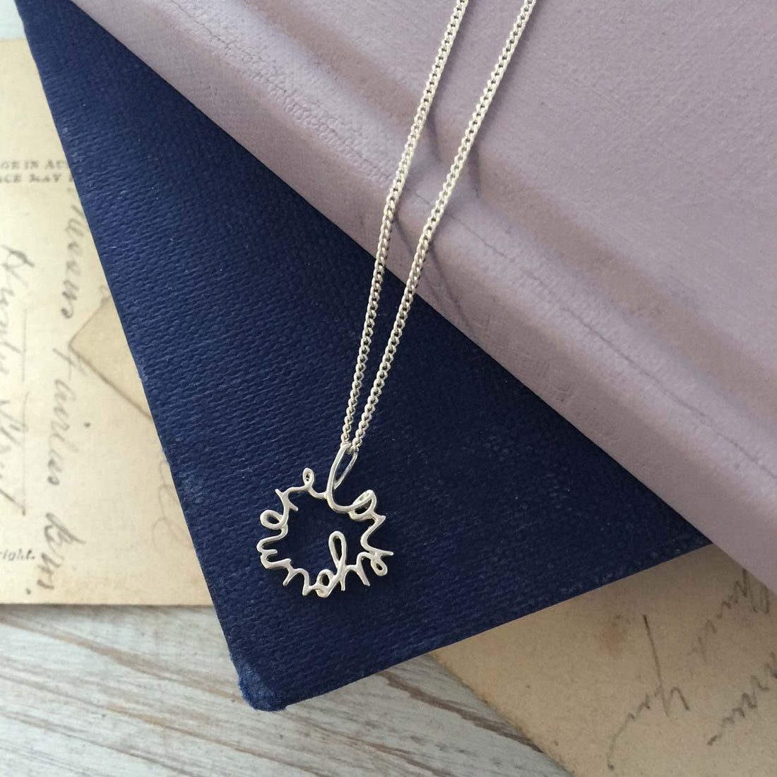 Love You More Petite Necklace in recycled sterling silver — delicate and symbolic, designed for everyday wear and layering.