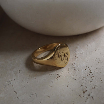 Triple Initial Signet Ring in 18ct Yellow Gold, featuring deliacately scrolled initials and a blend of historical significance and modern design.