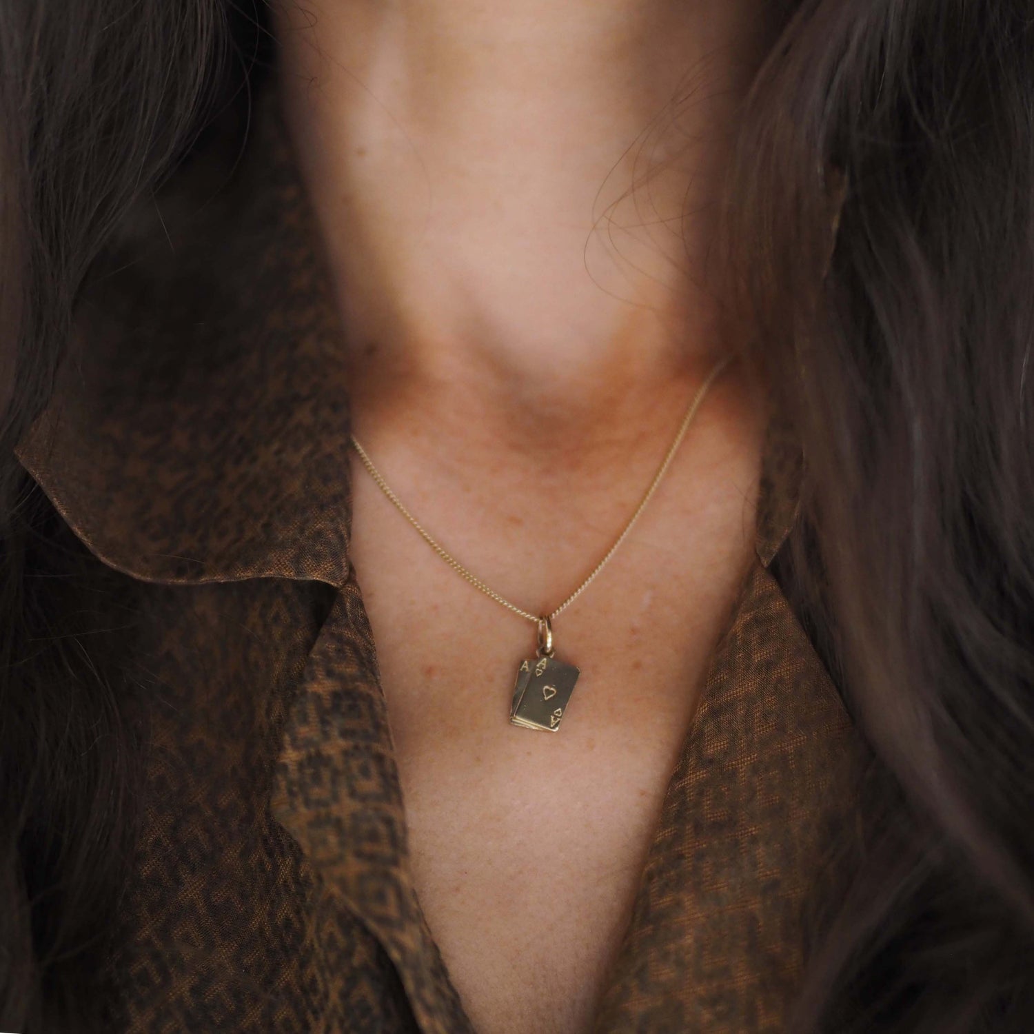 Ace Necklace featuring the Ace of Hearts and Ace of Spades in 9ct Solid Gold, representing luck, love, power, and passion – a meaningful jewellery piece