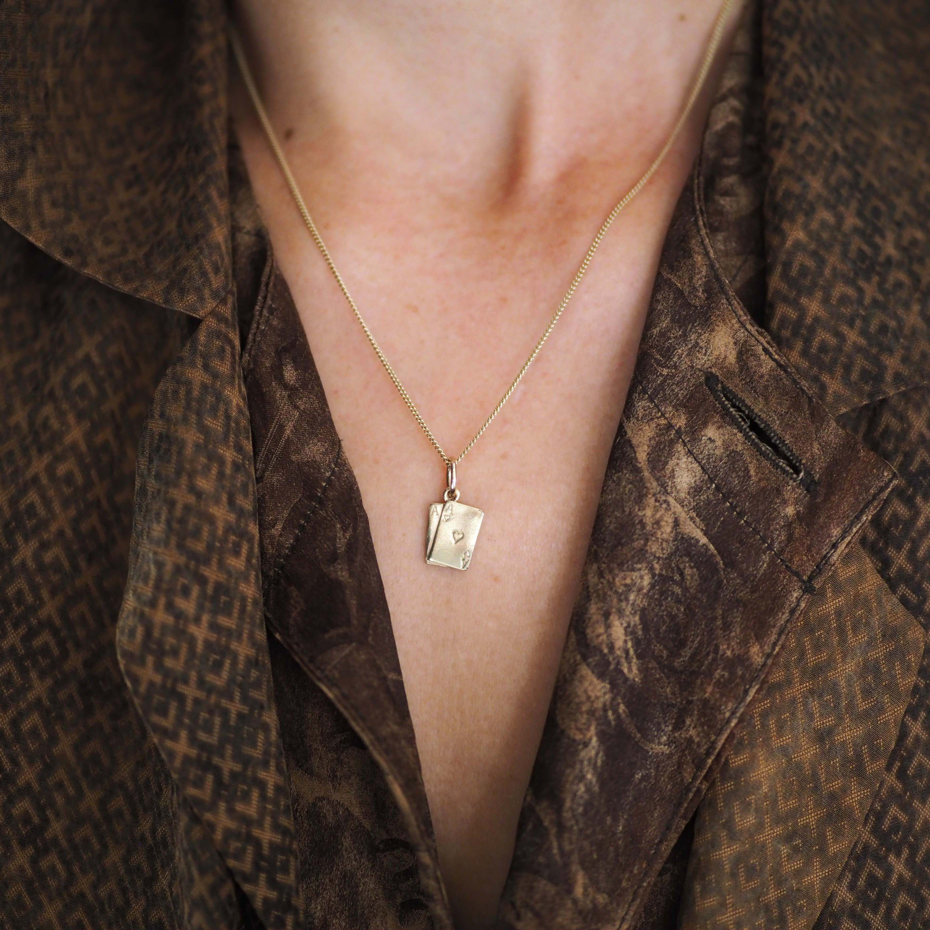 Ace Necklace featuring the Ace of Hearts and Ace of Spades in 9ct Solid Gold, representing luck, love, power, and passion – a meaningful jewellery piece