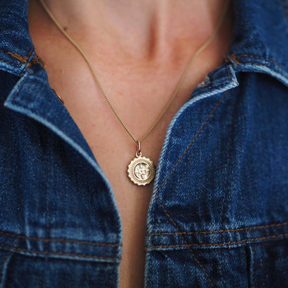 Compass Necklace in 9ct gold, symbolising guidance and protection. A timeless piece that captures the spirit of adventure, perfect for those embarking on new journeys.