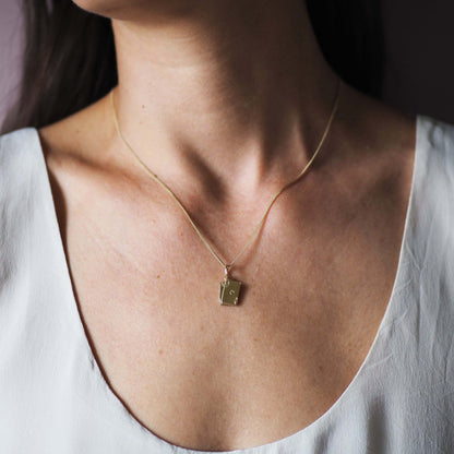 Ace Necklace featuring the Ace of Hearts and Ace of Spades in 9ct Solid Gold, representing luck, love, power, and passion – a meaningful jewellery piece