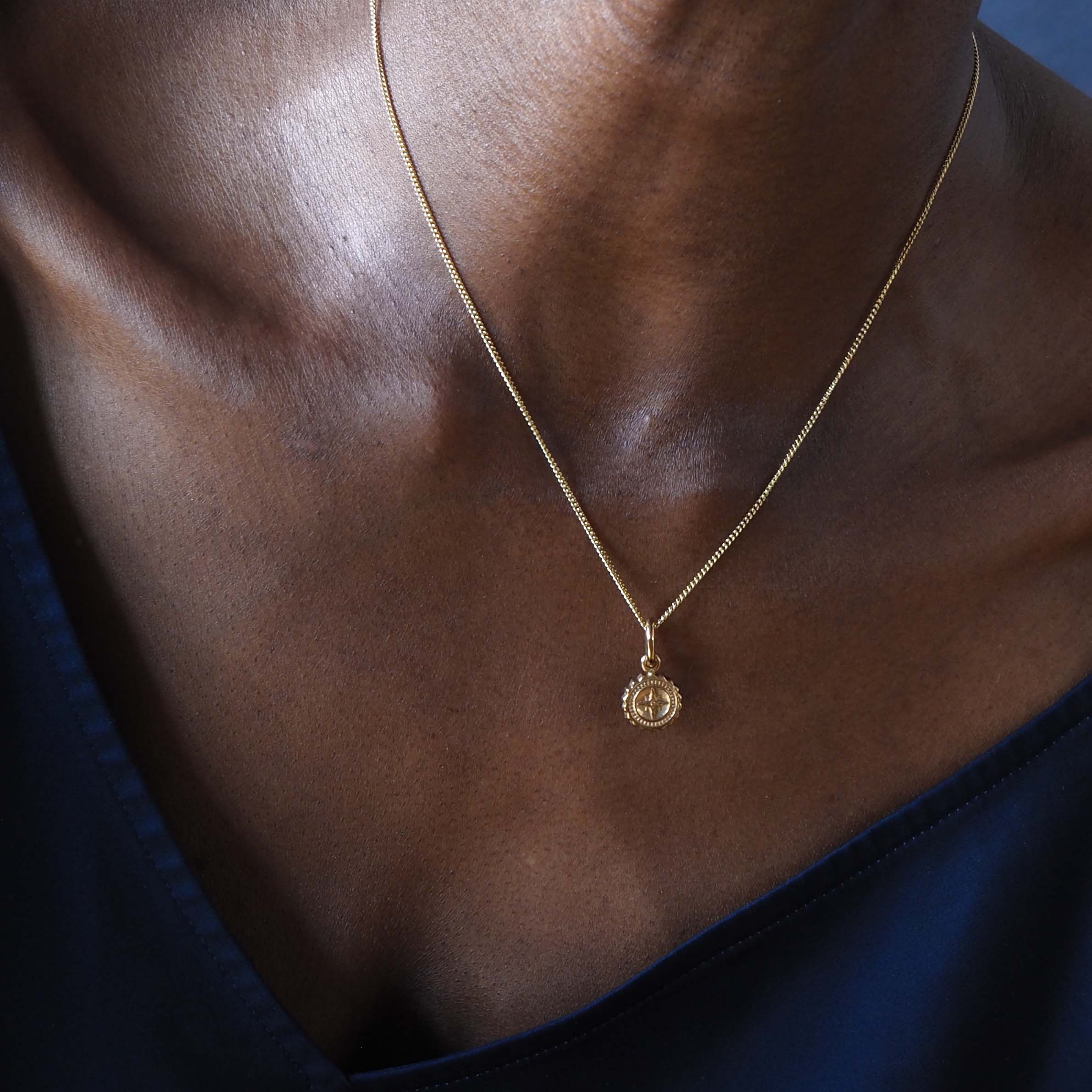 Compass Mini Necklace, a delicate charm symbolising guidance and protection, perfect for travellers and adventurers embarking on new journeys.