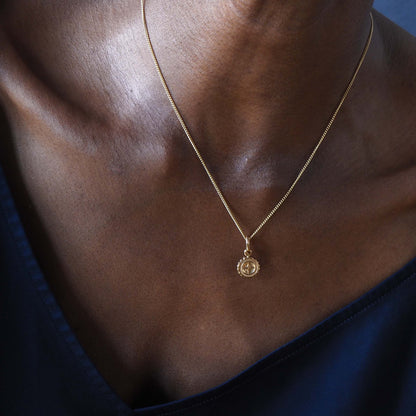 Compass Mini Necklace, a delicate charm symbolising guidance and protection, perfect for travellers and adventurers embarking on new journeys.