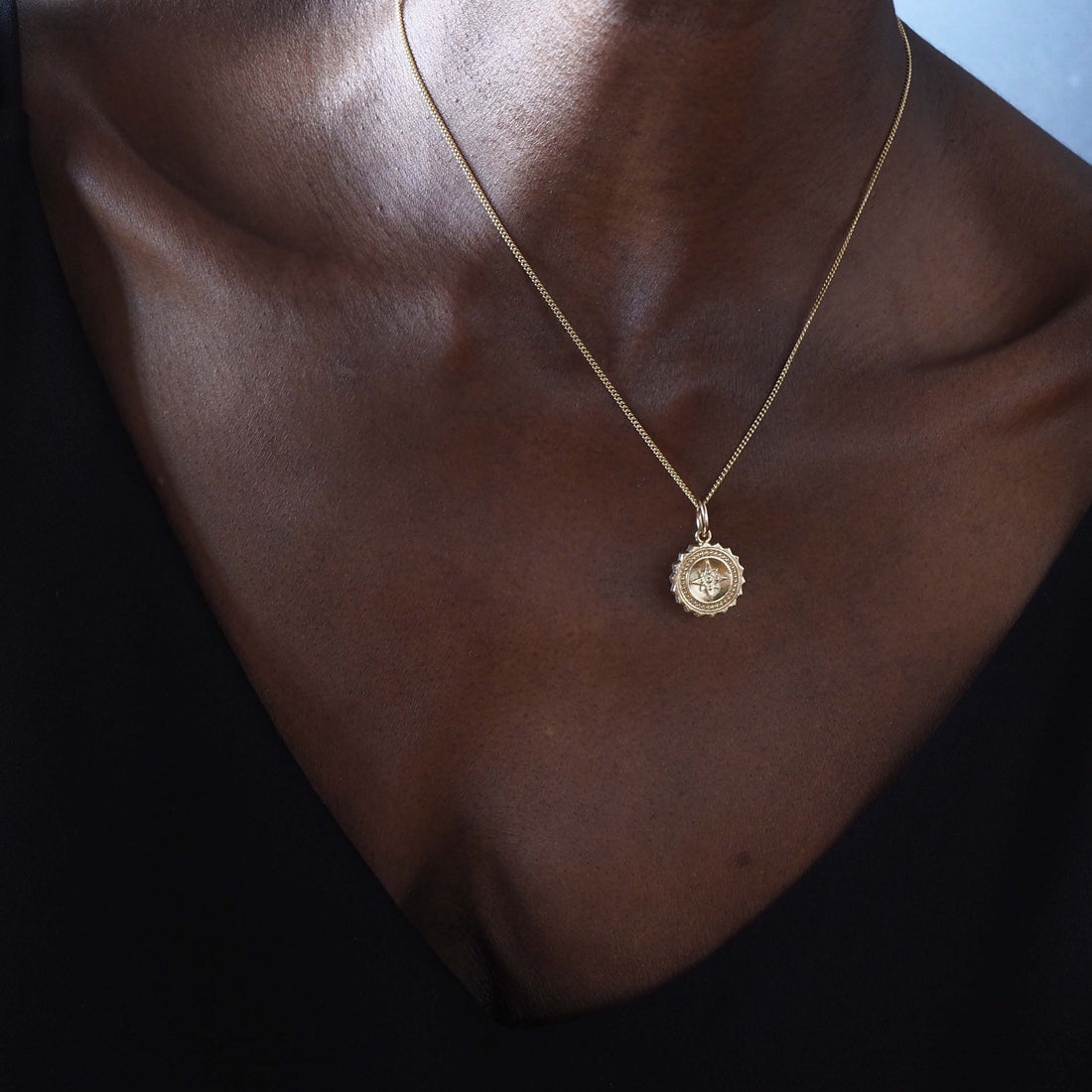 Compass Necklace in 9ct gold, symbolising guidance and protection. A timeless piece that captures the spirit of adventure, perfect for those embarking on new journeys.