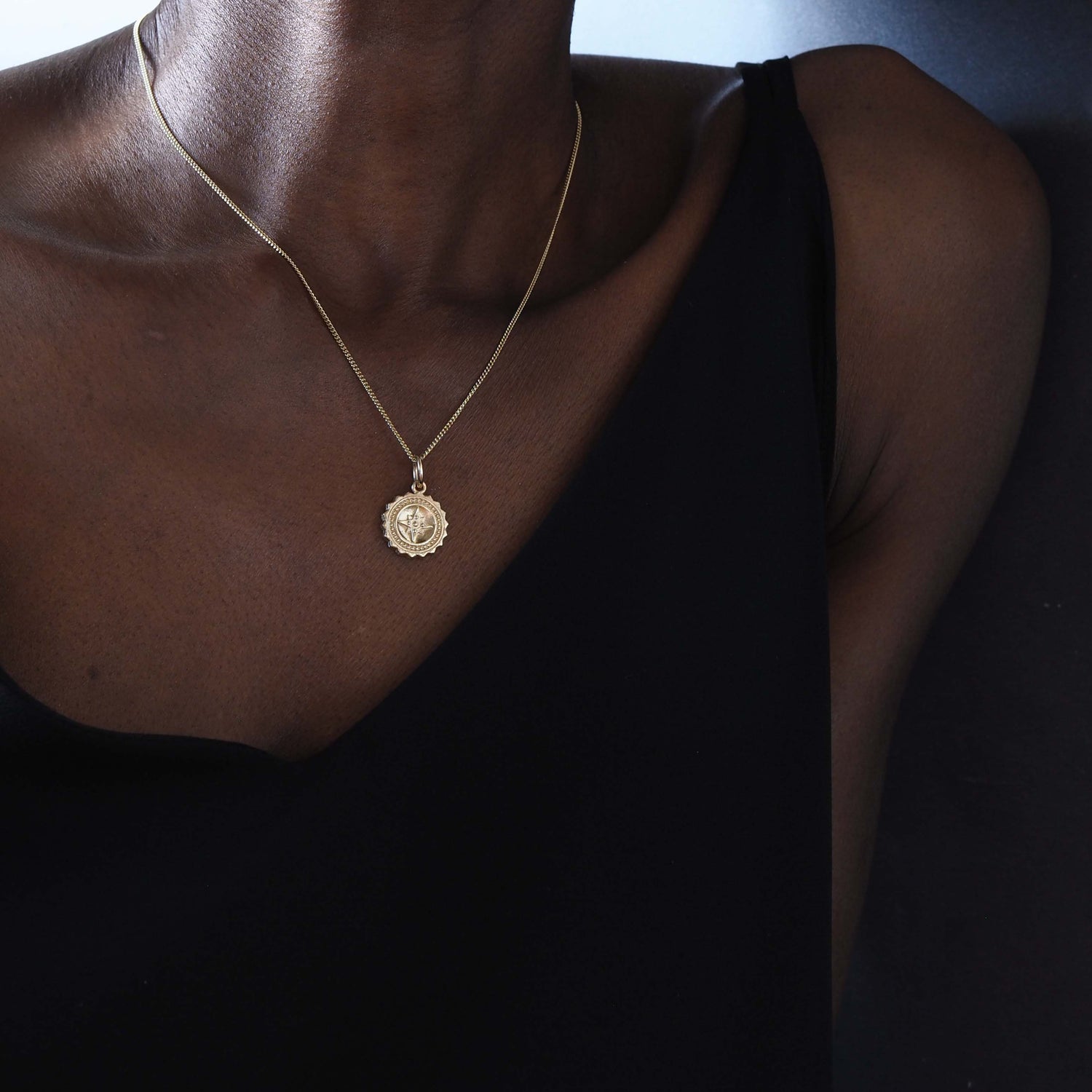 Compass Necklace in 9ct gold, symbolising guidance and protection. A timeless piece that captures the spirit of adventure, perfect for those embarking on new journeys.