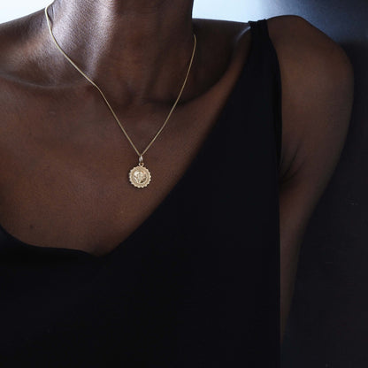 Compass Necklace in 9ct gold, symbolising guidance and protection. A timeless piece that captures the spirit of adventure, perfect for those embarking on new journeys.