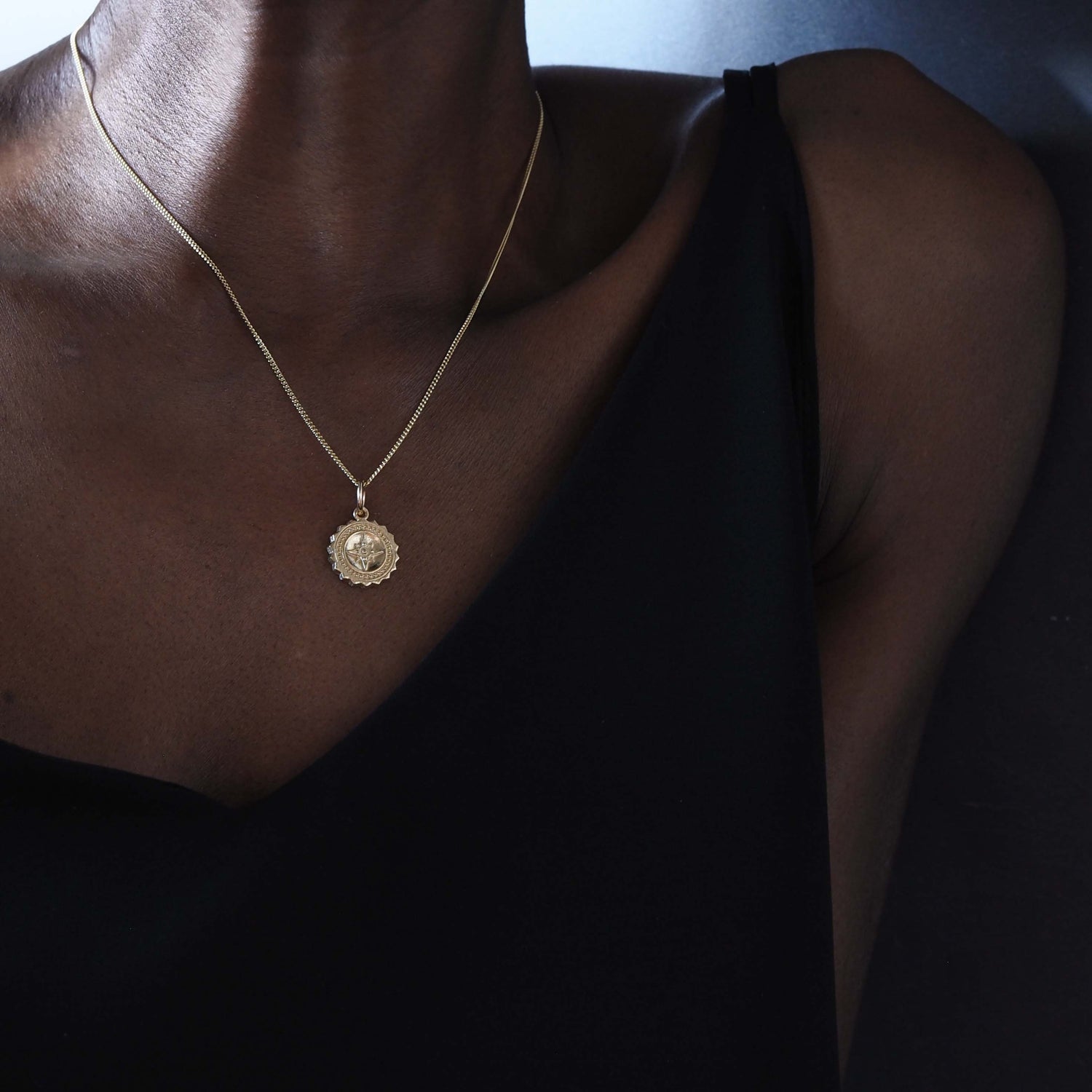 Compass Necklace in 9ct gold, symbolising guidance and protection. A timeless piece that captures the spirit of adventure, perfect for those embarking on new journeys.