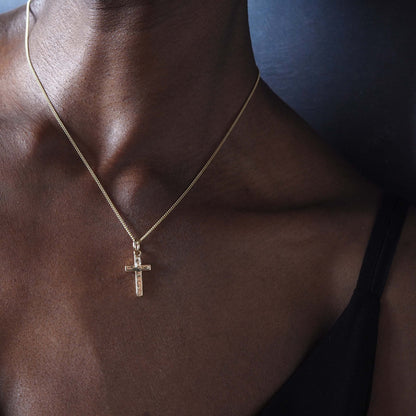 Solid Cross Necklace with engraved edges, symbolising protection, strength, and grace. A meaningful piece of jewellery for those seeking faith and tradition.