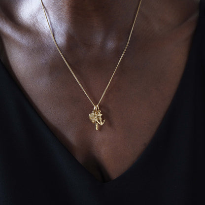 Faith, Hope, and Charity Necklace in solid 18ct gold, featuring a heart, anchor, and cross charm. Available in yellow, white, or rose gold, symbolising love, hope, and protection.