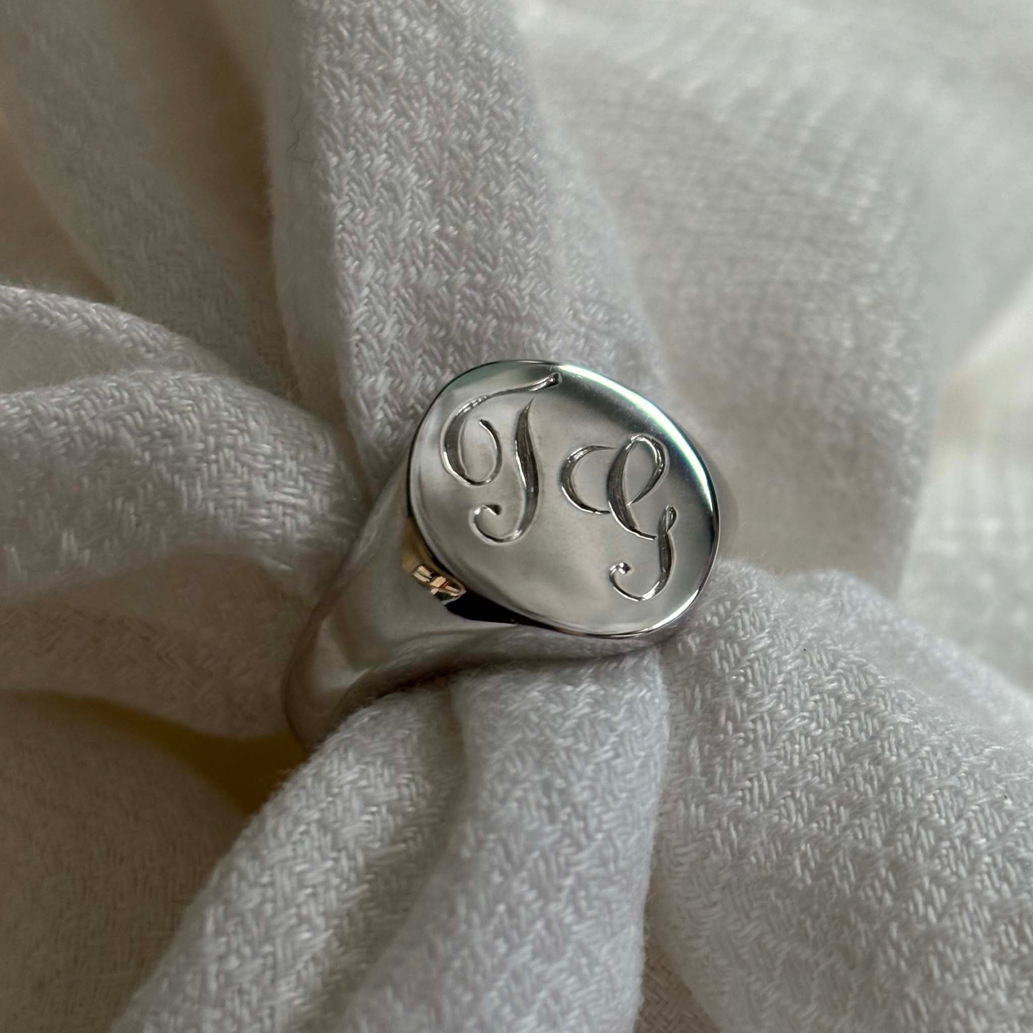 Solid Gold Double Initial Signet Ring with hand-engraved scrolled initials, featuring luxurious curves and a robust, classic form. Ideal for pinky or ring finger adornment.